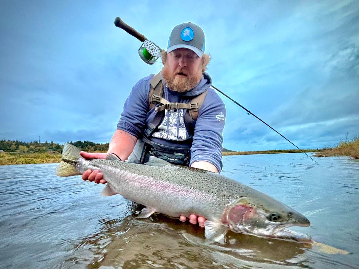 Justin Miller, Head Guide at Alaska Steelhead Co., with a steelhead