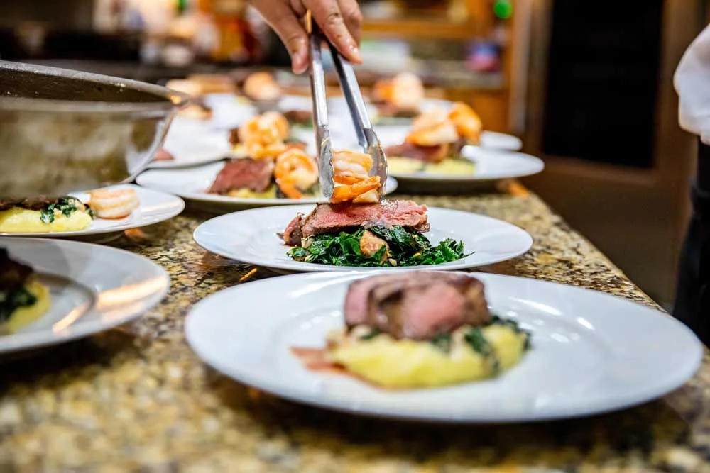 Shrimp being plated at the lodge